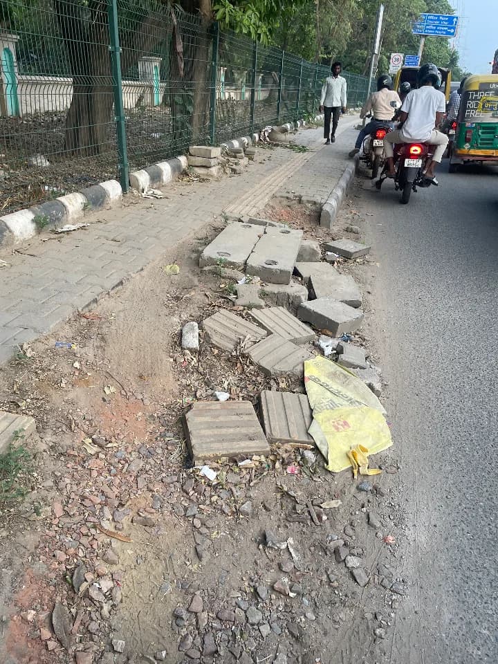 broken sidewalk in Sector 52A